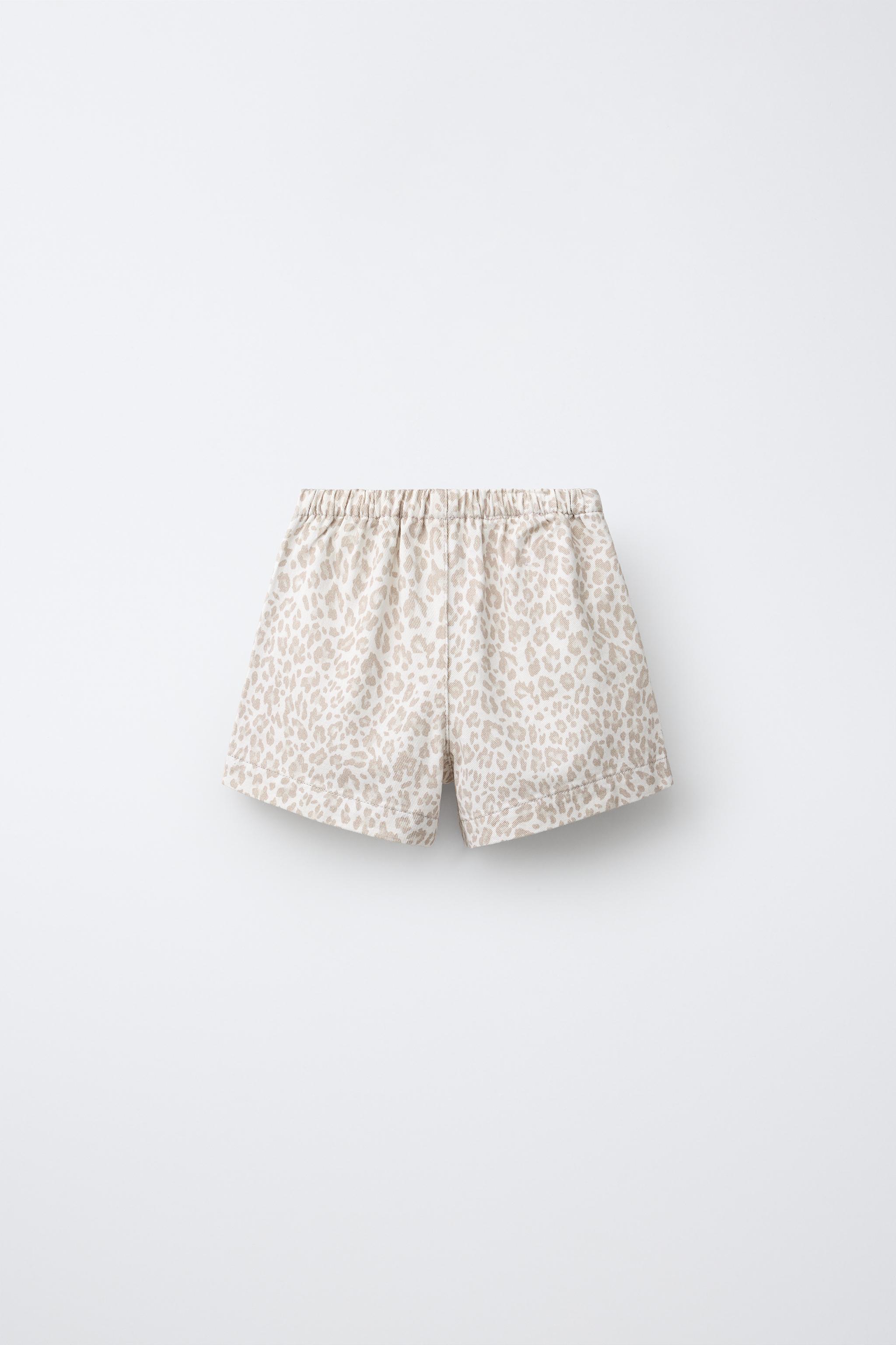 ANIMAL PRINT DENIM SHORTS